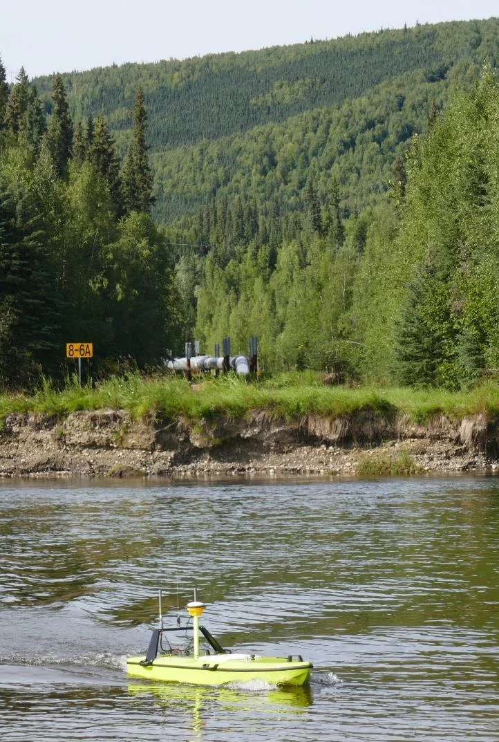 CEE-USV surveying the Chena River with the pipeline visible on the far bank