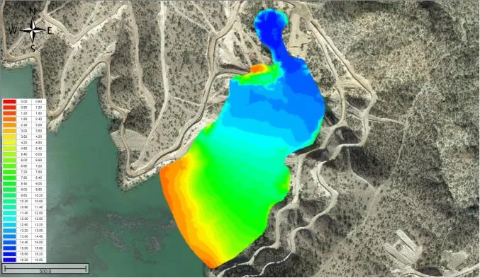 Colour-coded bathymetry map of the tailings pond over aerial imagery