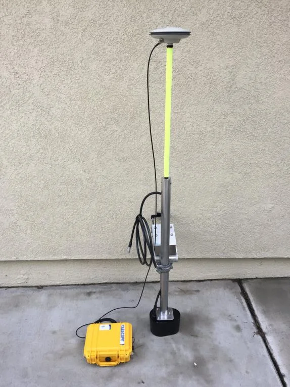 CEESCOPE case with GNSS antenna and transducer pole standing on a concrete floor