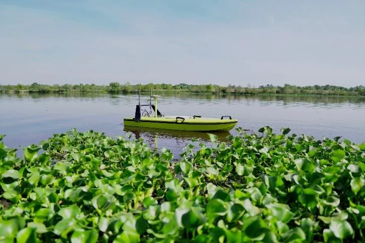 CEE-USV on a large wastewater lagoon with floating vegetation