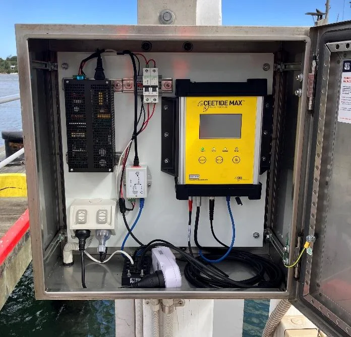 CEETIDE MAX unit mounted inside an open stainless-steel cabinet at Bullock Island