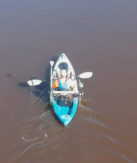 Aerial view of the blue survey kayak on the lake
