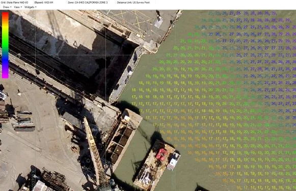 HYPACK XYZ survey results on a 10 ft grid over an aerial image of the dry dock