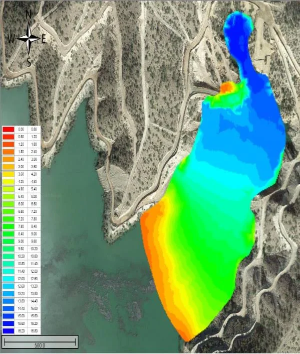 Colour bathymetry map of the tailings impoundment over an aerial image